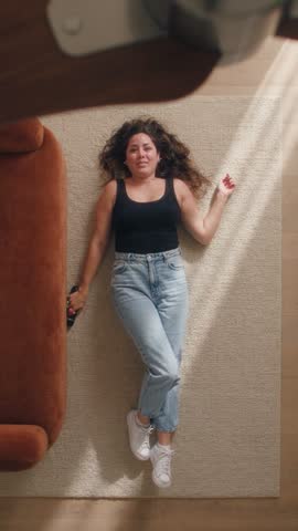 LOOK 01: a black tank top and jeans, from the photo