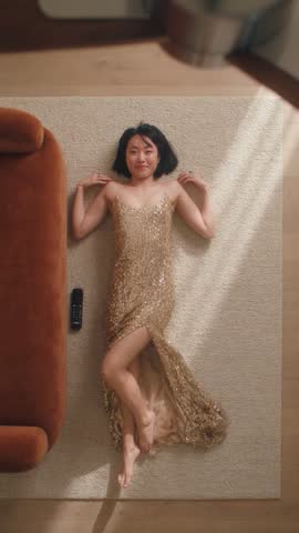 LOOK 02: Gold sequin gown